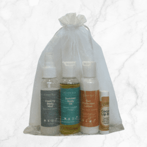 Sun Protection Gift Set- Travel Size Includes: 2oz sun protection lotion, 2oz summer body oil, 2oz cooling mist, and a coconut lip balm.