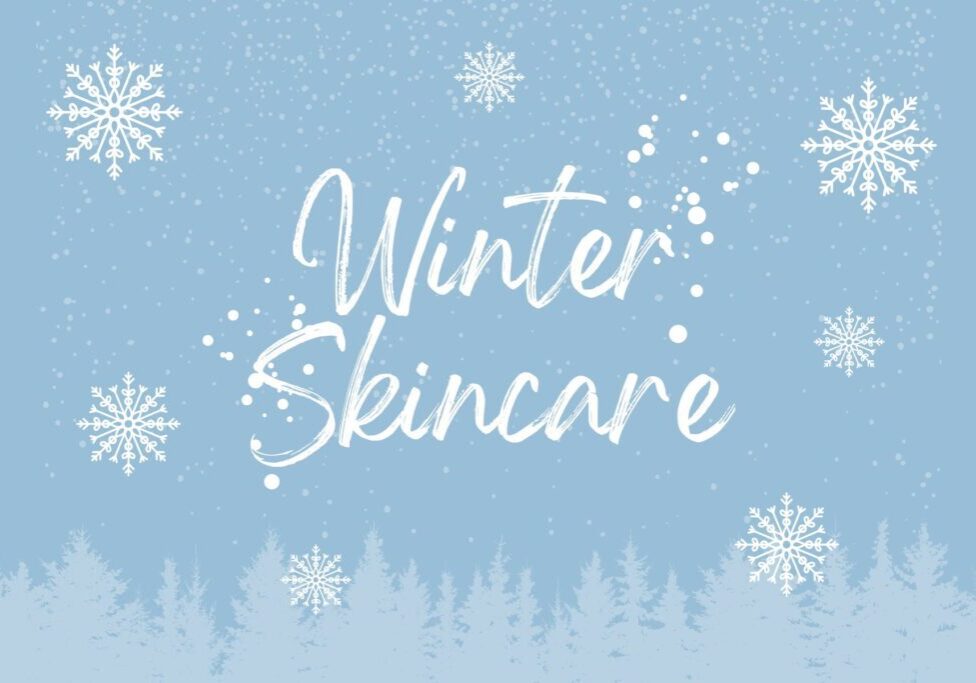 Light blue background with white snowflakes, falling snow, and a silhouette of pine trees at the bottom. “Winter Skincare” is written in a white, handwritten script—perfect for highlighting natural skincare tips for cold weather.
