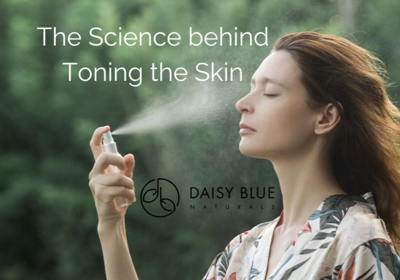 A woman with closed eyes sprays a skincare toning mist on her face outdoors, with the text "The Science behind Toning the Skin" and the Daisy Blue Naturals logo overlaid on the image.