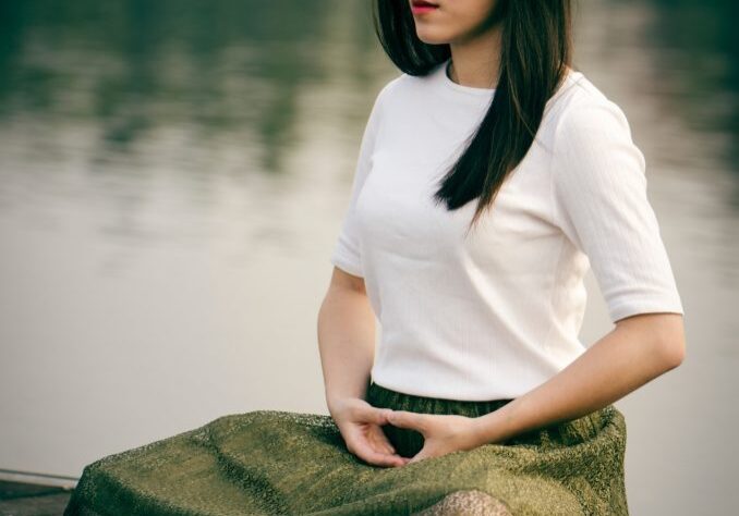 woman mindfully breathing